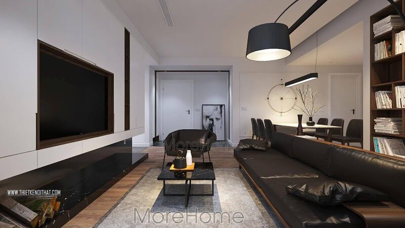 Bộ sofa da gỗ màu đen cao cấp là điểm nhấn lớn trong phòng khách với tông màu trắng làm chủ đạo, nó tạo nên một điểm nổi bật.